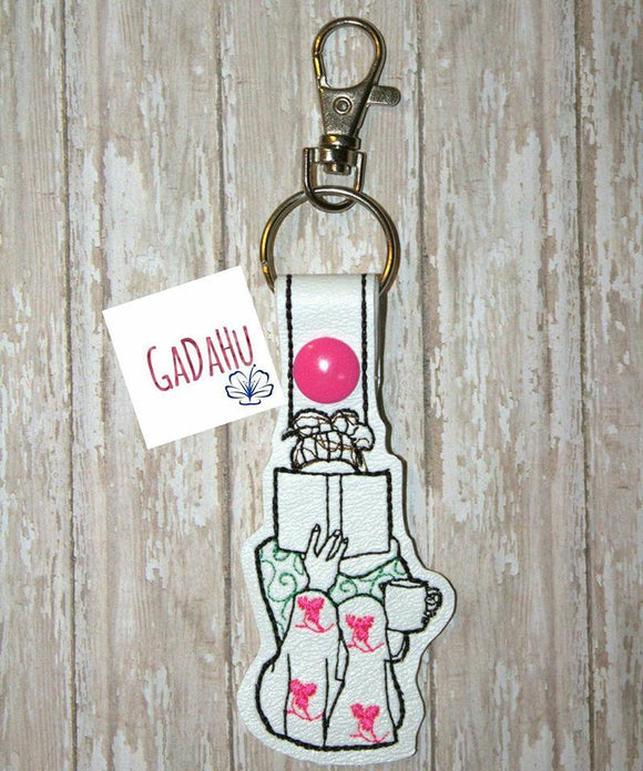 Girl reading Key Fob Snap Tab Embroidery Design. Instant digital download